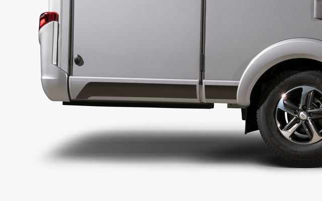 HYMER-Reisemobil seitliche Heckansicht mit Rückleuchte, Garage und Hinterrad